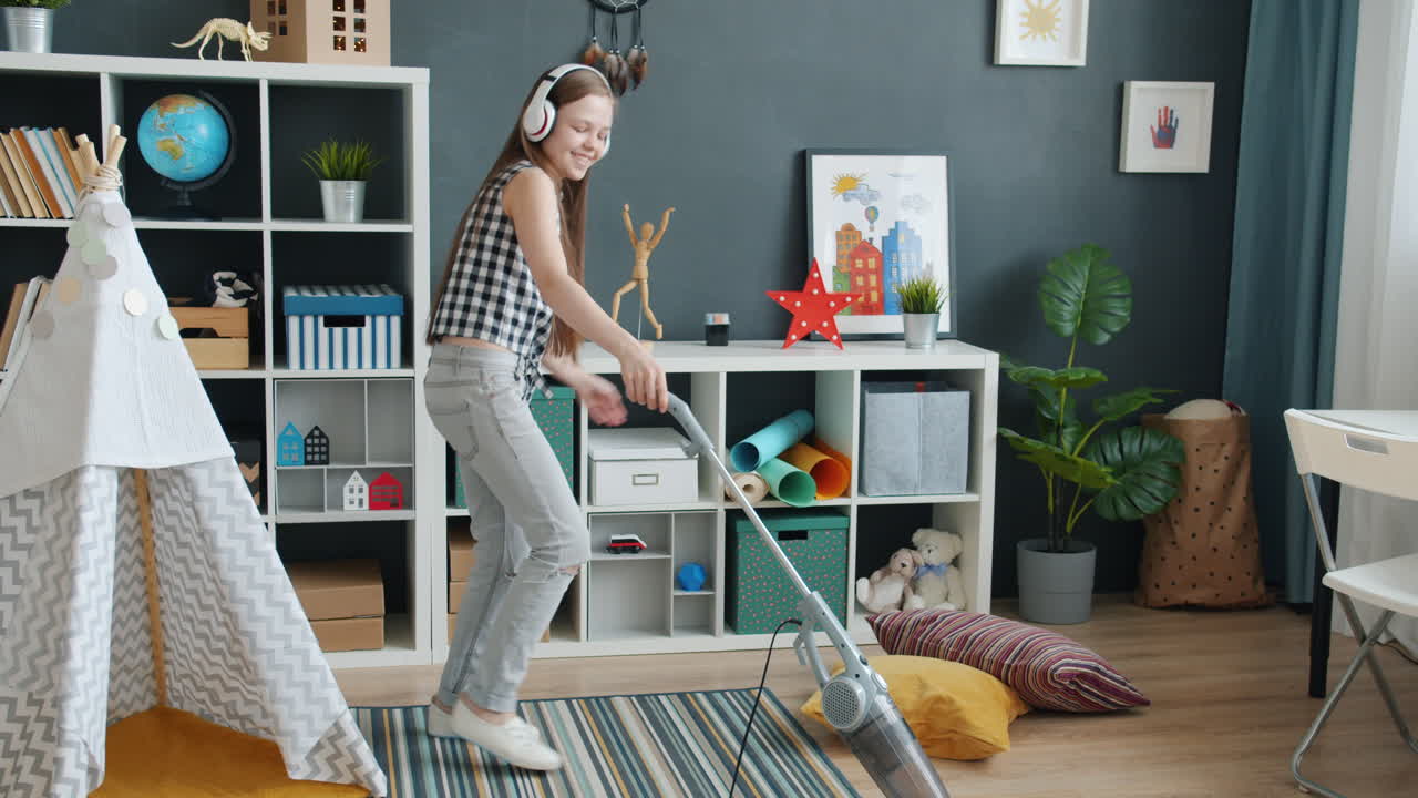 Girl Cleaning Her Playroom While Listening to Music