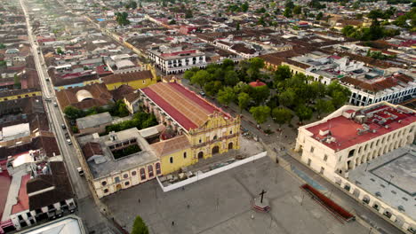 rotational aerial view of the church and main square in san cristobal de las casas in chiapas mexico