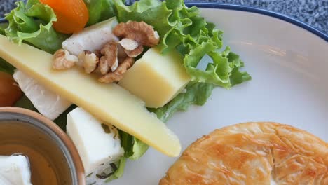 cheese platter with dried fruits and nuts