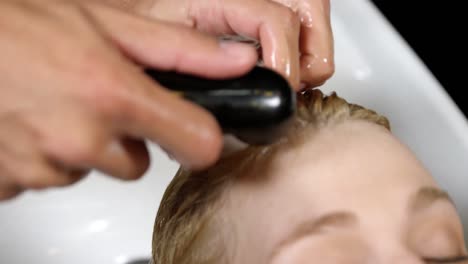 woman getting her hair wash