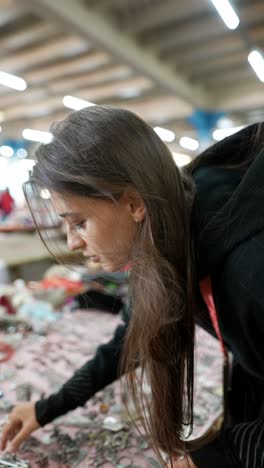 woman browsing jewelry at a market