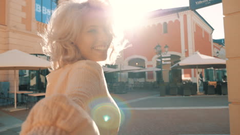 woman in a city enjoying the outdoors