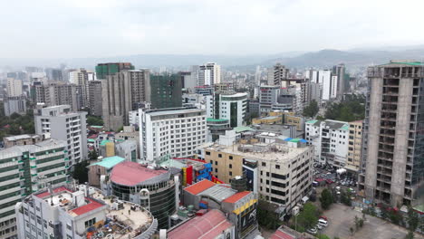 flyover bole district (sub-city) of addis ababa, ethiopia, east africa. aerial drone shot