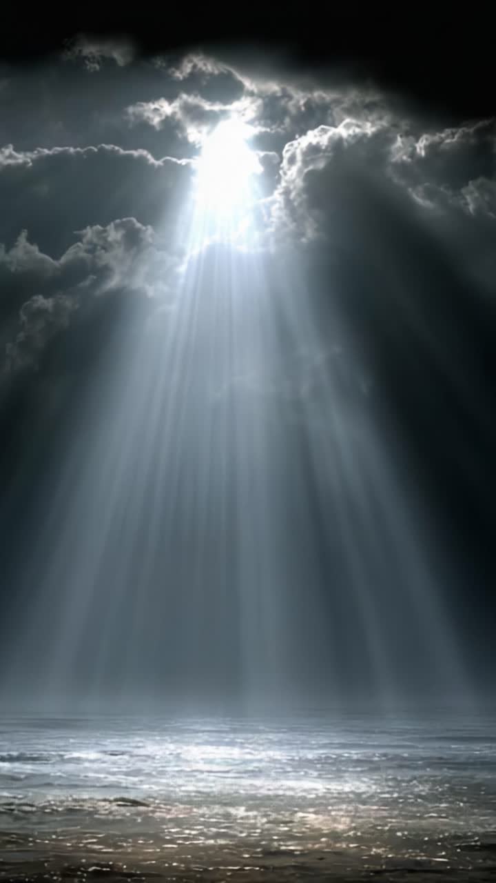 A Captivating Display of Light: Rays Pierce Through Dark Clouds, Illuminating Serenity over a Still Ocean and Creating a Mesmerizing Atmosphere of Tranquility