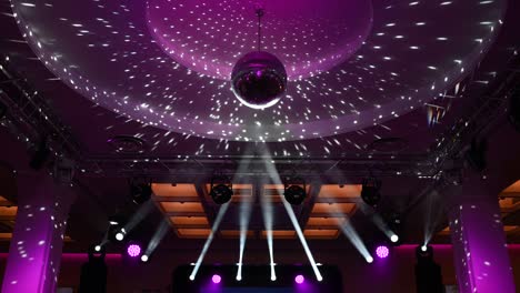 disco ball, view from below, from the disco ball beams, stage light, mirror ball