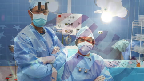 animation of flag of usa waving over surgeons in operating theatre