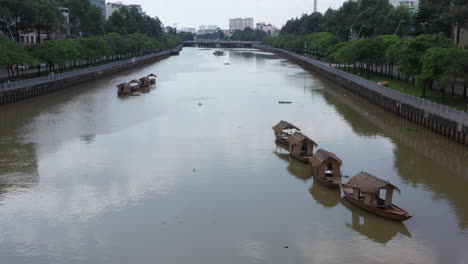 Flying-along-a-Ho-Chi-Minh-City-canal-in-Binh-Thanh-district