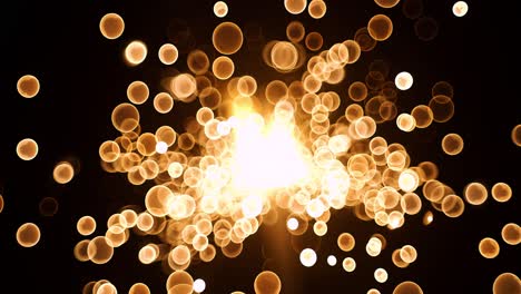 el brillo abstracto de las partículas de burbujas de bokeh de oro que vuelan sobre un fondo negro, las partículas de bokeh del oro rojo naranja y el polvo vuelan en el aire en la cámara de cámara súper lenta de 1000 fps.