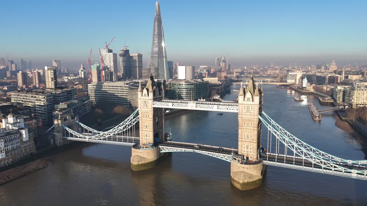 Breathtaking aerial pan of Tower Bridge, London, capturing its historic charm and the stunning South Bank skyline. Perfect drone footage for cinematic, travel, and documentary projects.
