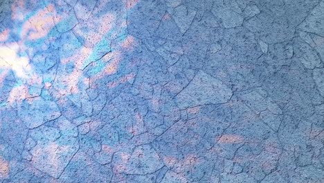 cracked sky: a study in texture and light blue