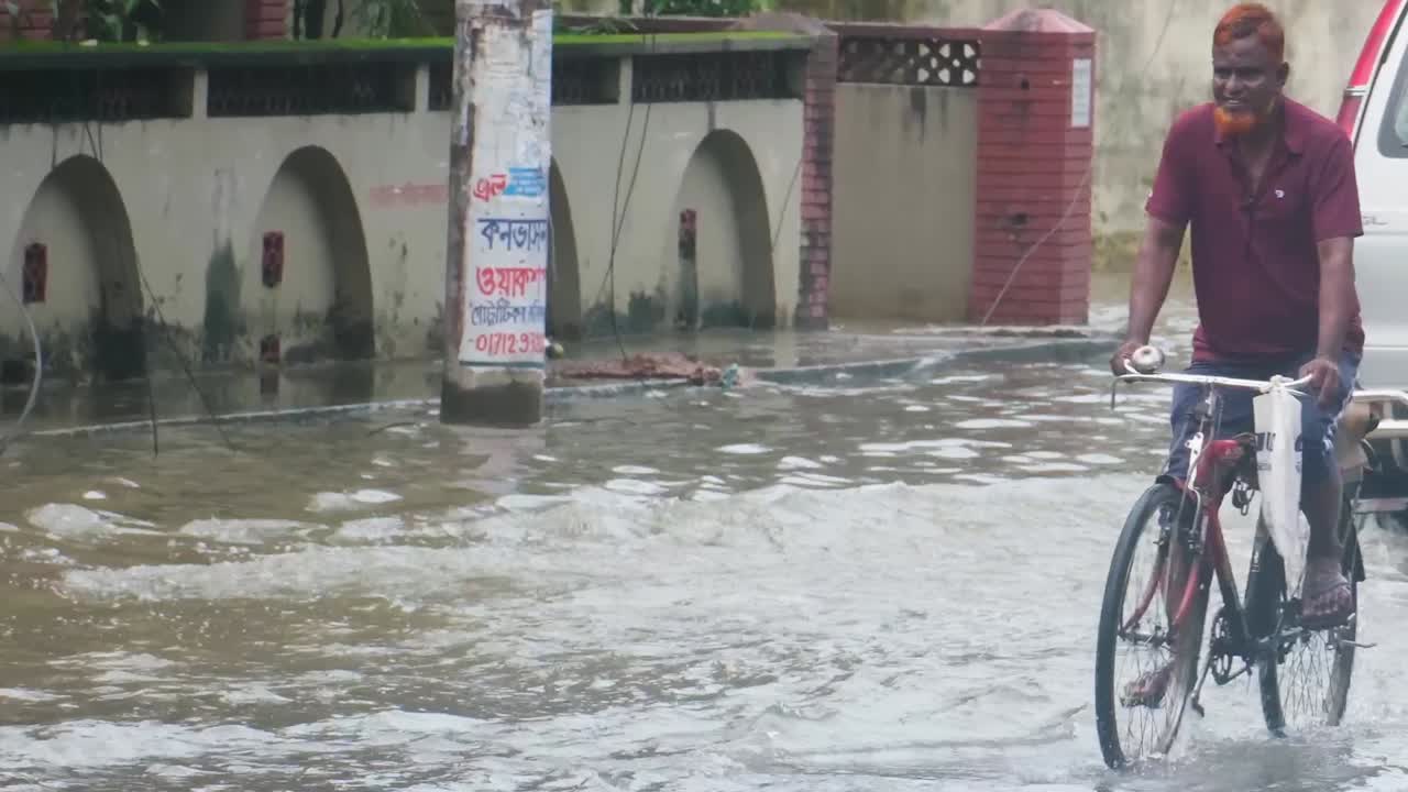 Dhaka, Bangladesh flooded streets, Buriganga river overflowed monsoon season