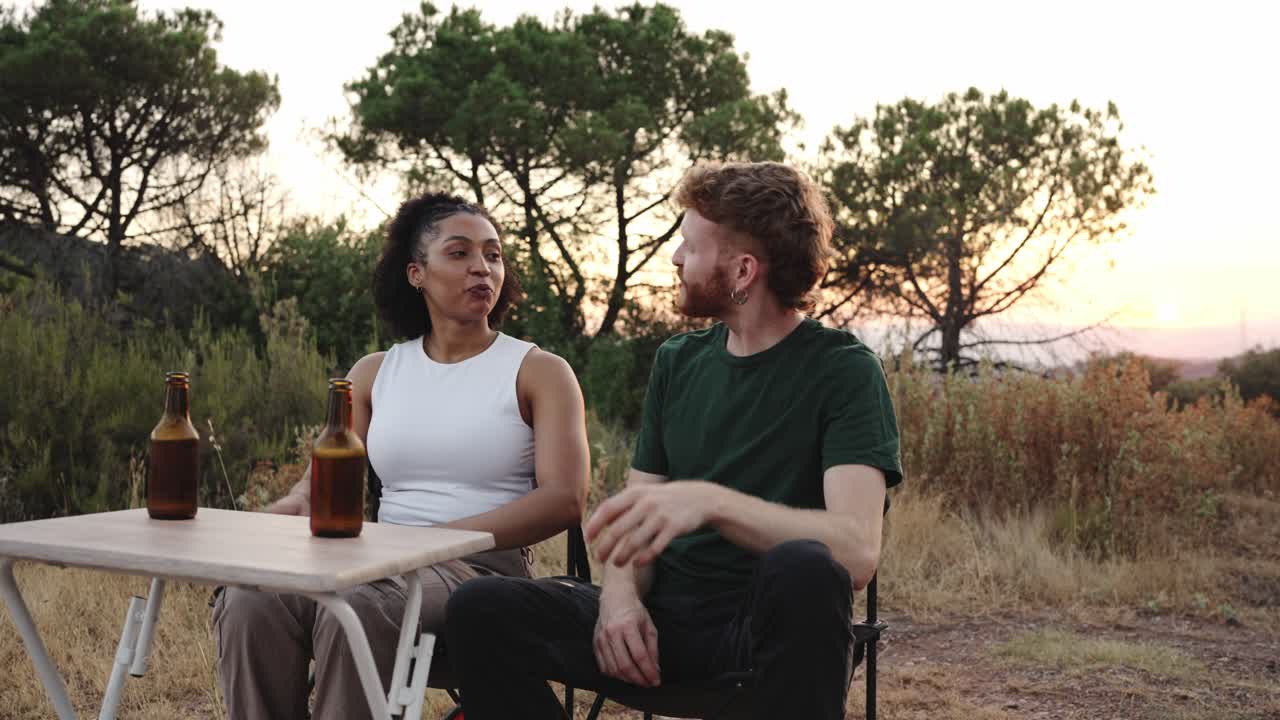 People drinking beer outdoors