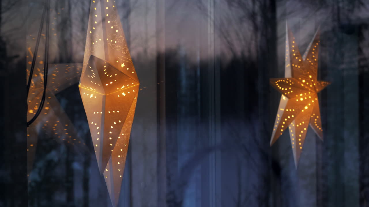 Beautiful christmas decoration hanging in windows, dolly motion