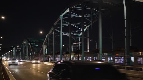 people commute after work in downtown seoul at night