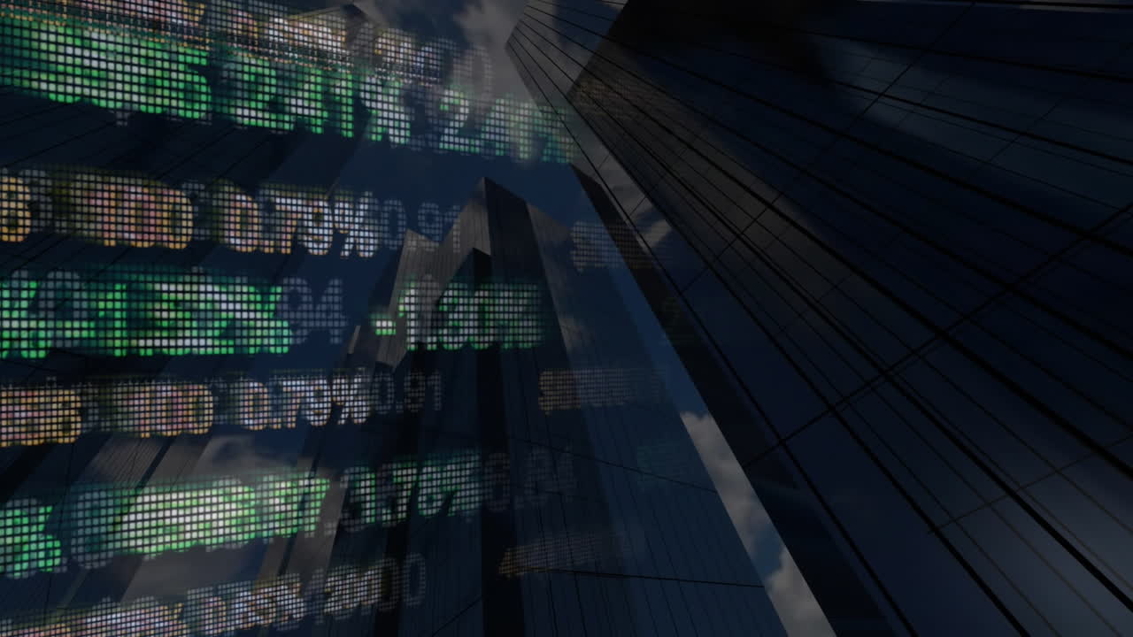 Aktiedata projiceret på skyskrabere på Wall Street i New York City