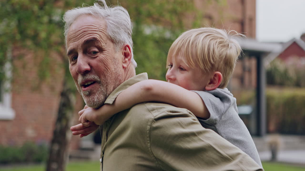 Grandfather and Grandson Enjoying a Piggyback Ride