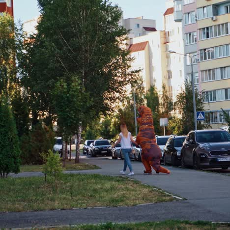 person in dinosaur costume