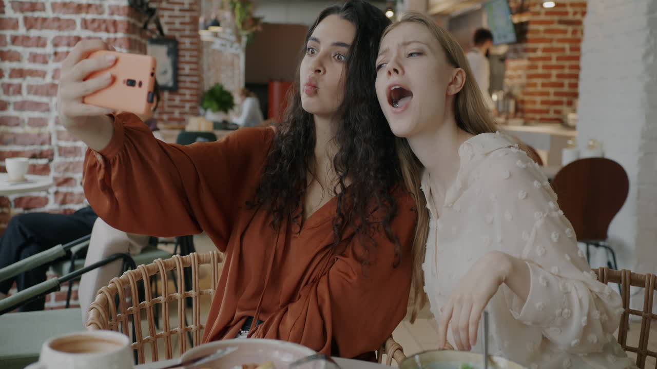 Friends Taking Selfie in a Cafe
