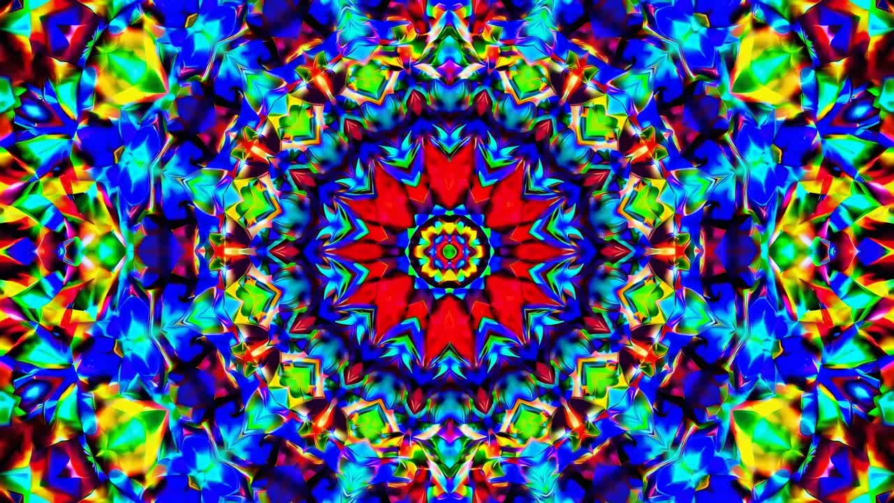 Vibrant kaleidoscope pattern with symmetrical, colorful geometric shapes