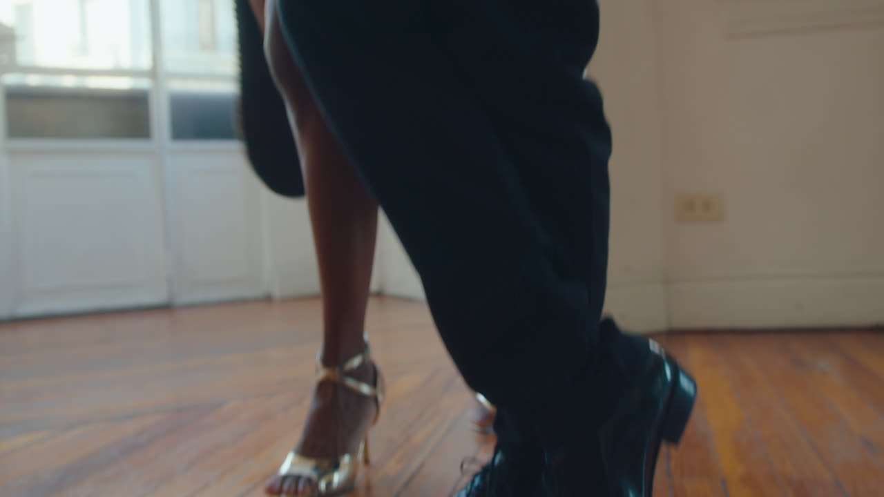 Talented Couple in Stage Costumes Dancing Argentine Tango