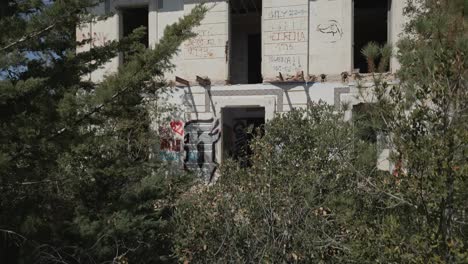 aerial reveal of la casa lila, barcelona an abandoned house and historical landmark