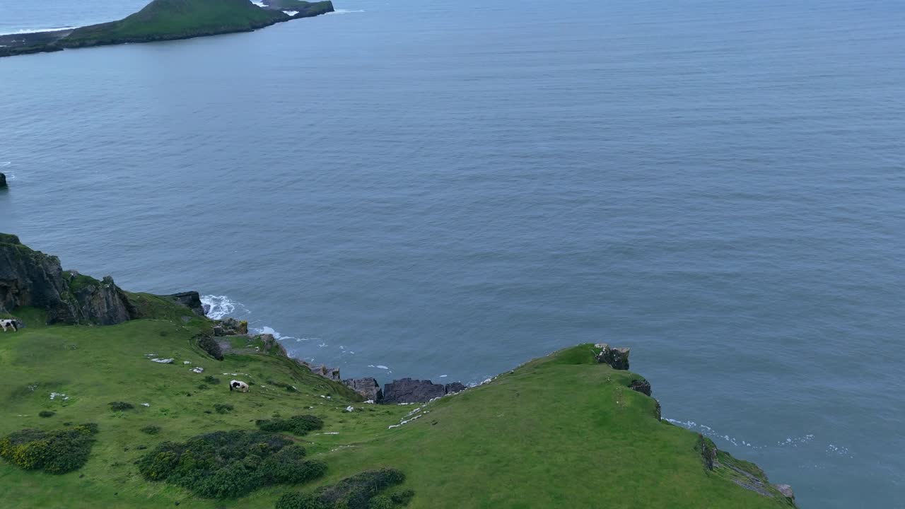 Rugged cliffs, South Wales landmark, Irish Sea, coastal waters, aerial