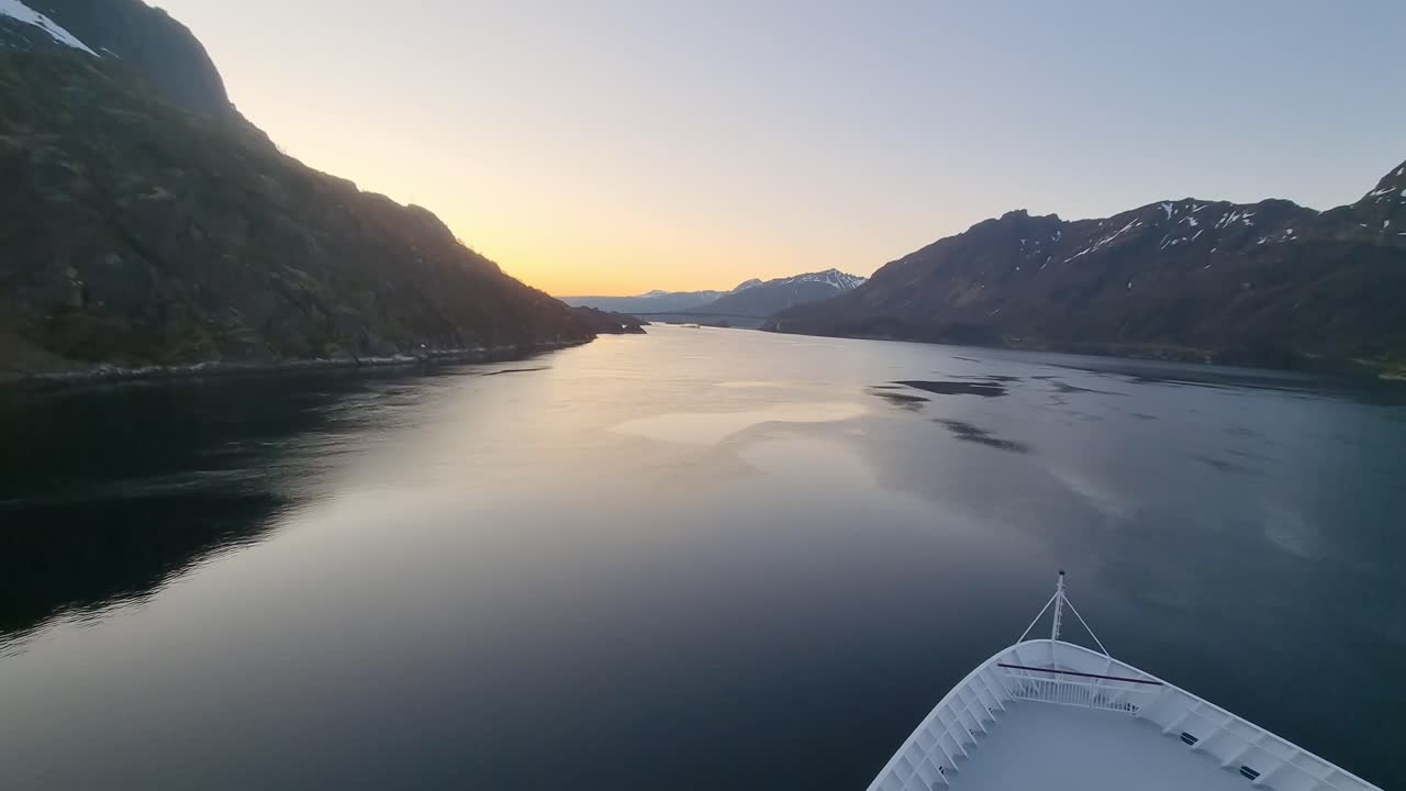The view from the deck of a cruise ship sailing along the coast of NorwayThe view from the deck of a cruise ship sailing along the coast of Norway