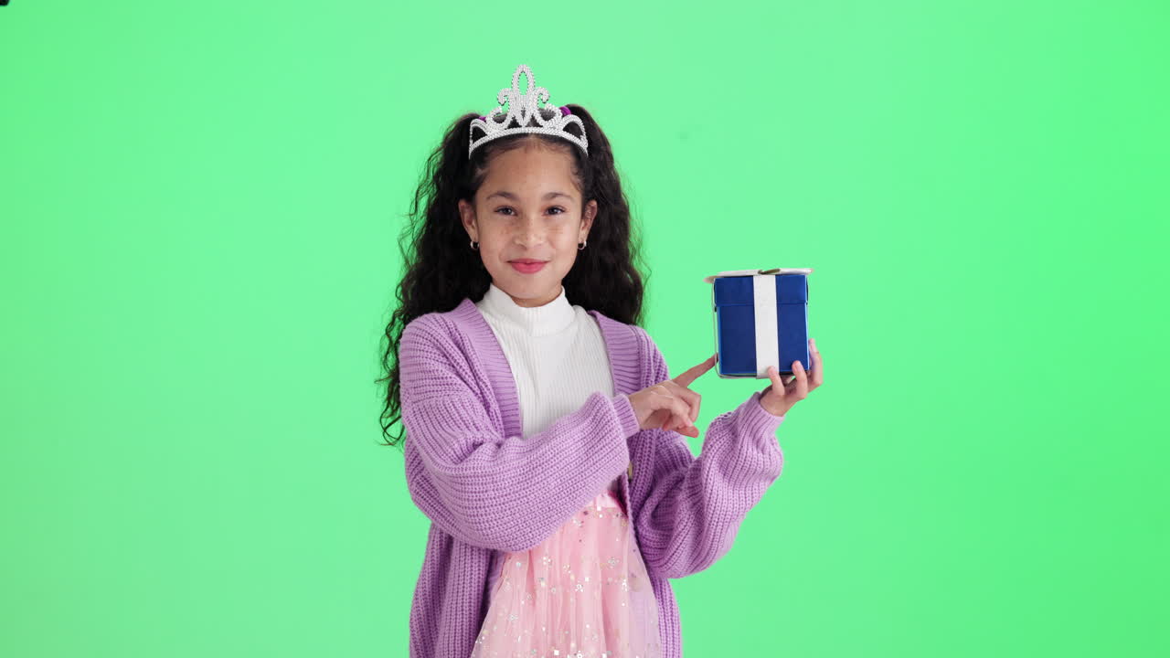Girl with a present on a green screen