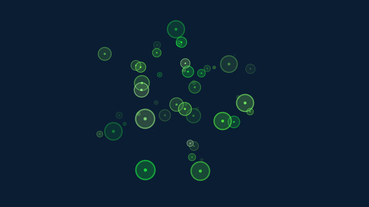 A striking image of green circles in a radiant circular arrangement against a dark backdrop, creating an illusion of floating orbs with a luminous glow