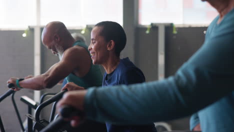 senior citizens group exercise class at the gym