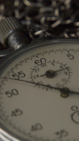 stopwatch on the brown wooden table