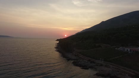 Ascending-aerial-view-of-sunset-on-the-coast-of-Croatia