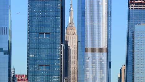 manhattan skyline buildings close up during bright day with clear blue sky