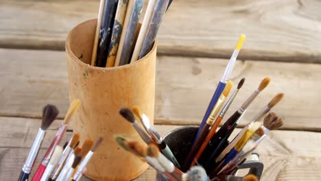 various paintbrush in container