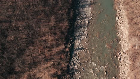 Aerial-–-Revealing-shoot-over-a-river-in-Apennines