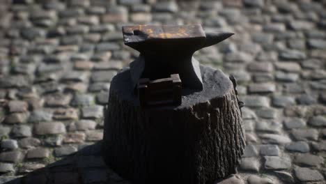 old anvil attached to a stump