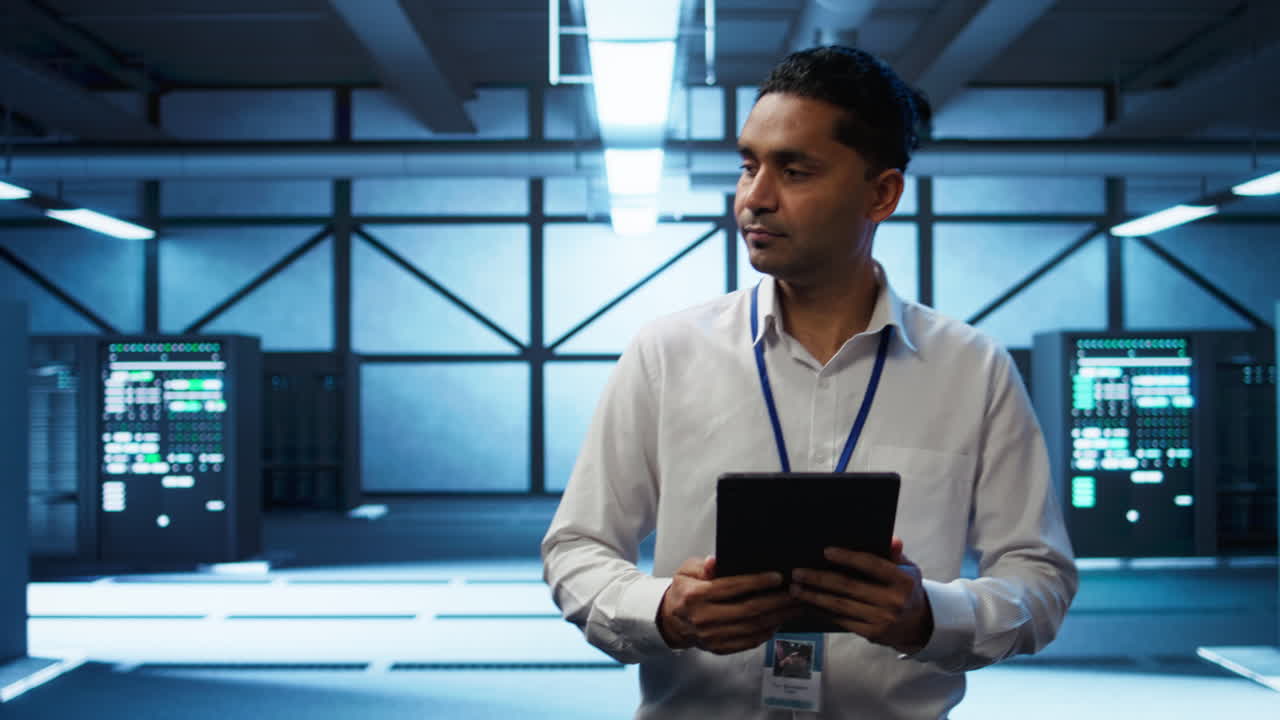 Security analyst in data center monitoring and analyzing security threats