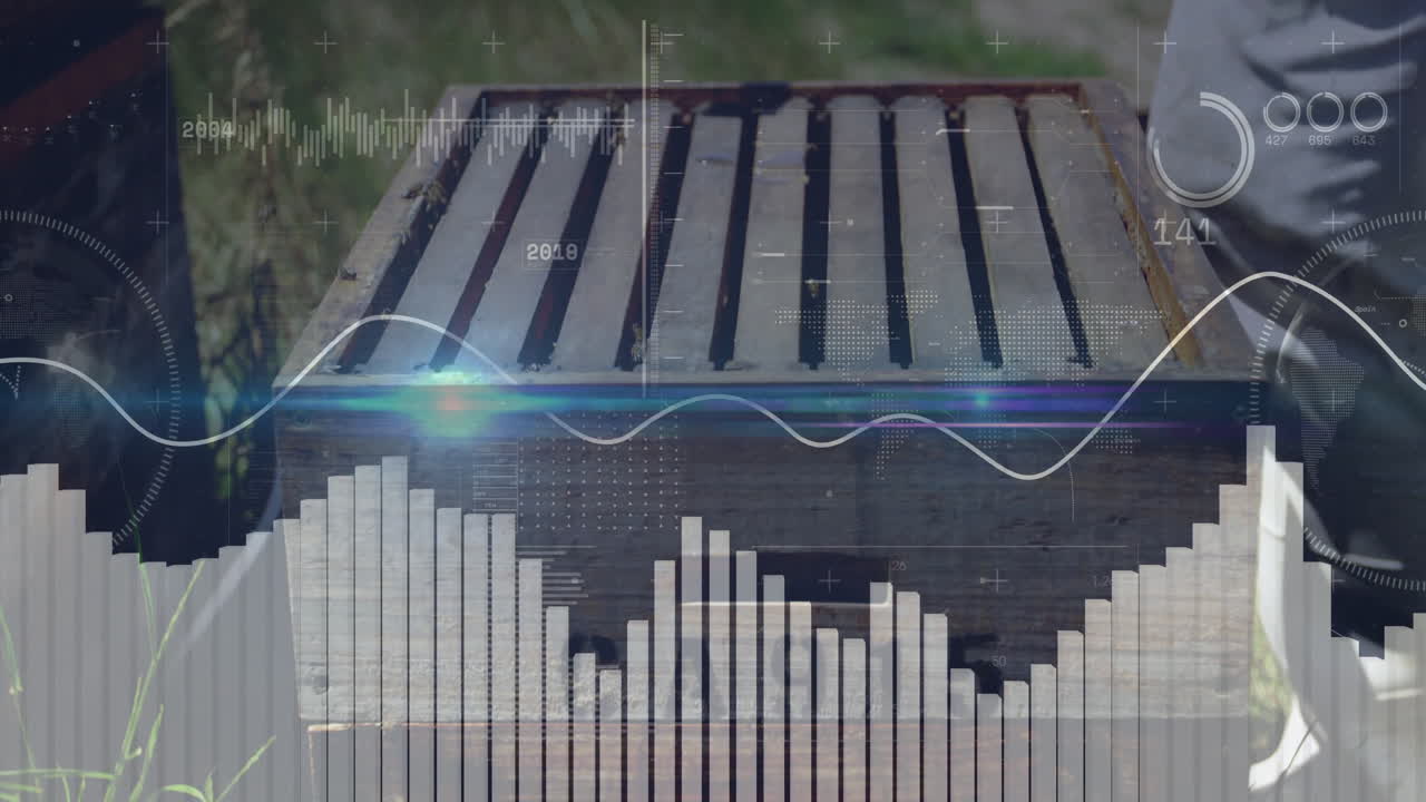 Animating bar graph and waveform over wooden box outside in natural light