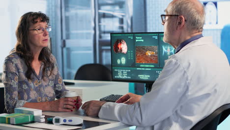 vertical video physician highlights mri scan advising on cancer treatment options