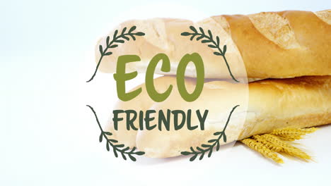 animation of eco friendly text banner against close up of fresh bread and wheat ears