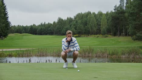 man playing golf on a golf course