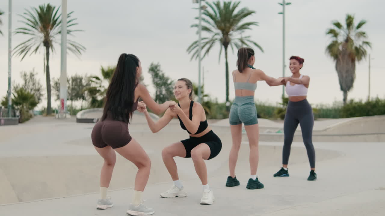 Women Exercising: Squats With Friends Outdoors