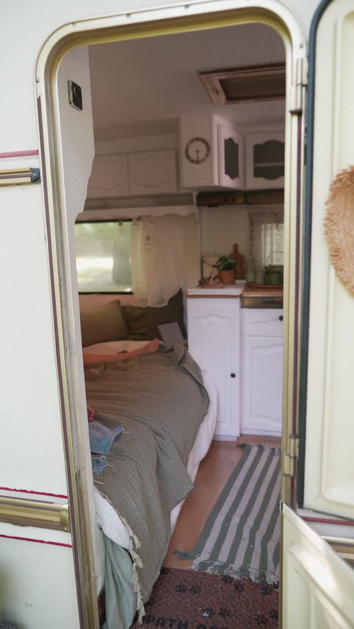 Two Women Relaxing in a Campervan