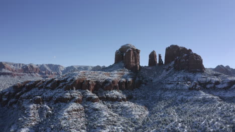 aerial pan 2 of cathedral rock near oak creek, sedona arizona - after a snowfall