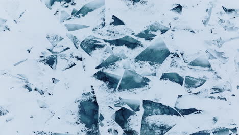 Drone-of-strange-ice-formation-in-lake-Michigan,-starting-high-and-flying-low