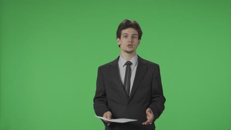 businessman giving a presentation on green screen