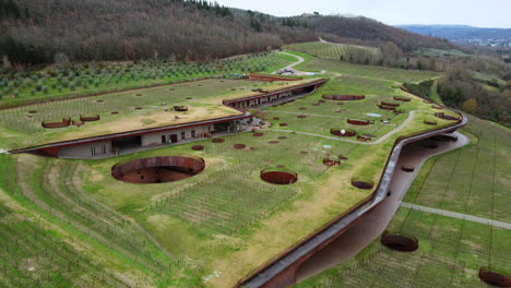 top shot of modern winery in tuscany unveiling details of the interior