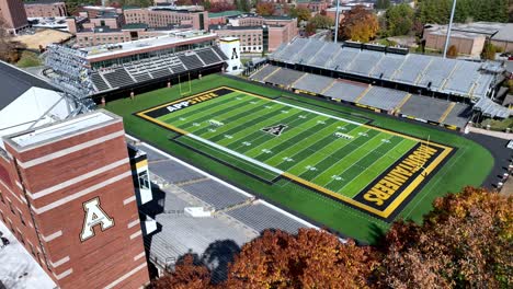 aerial-push-in-to-kidd-brewer-stadium-on-the-appalachian-state-university-campus-in-boone-nc,-north-carolina