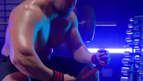 muscular man working out in a gym