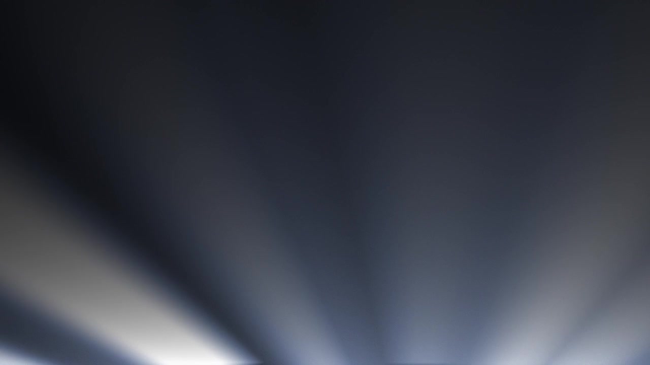 Abstract Light Rays Moving Across a Dark Background